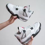 Air Jordan 4 “White Cement” 2025 GS — in-hand lateral view